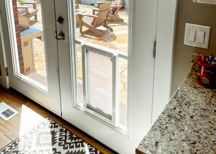 White French door with vertical Pet Door glass panel insert
