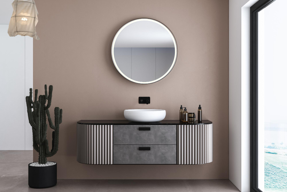 Round backlit Bathroom mirrors above vanity with marble counter